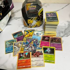 Pokemon TCG 350 bulk card lot with collectible metal tin and holos!